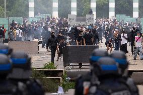 Protesters clash with police after the commemoration march for Nahel - Nanterre