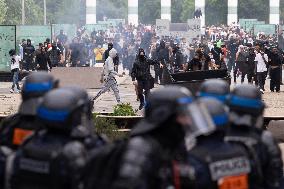 Protesters clash with police after the commemoration march for Nahel - Nanterre