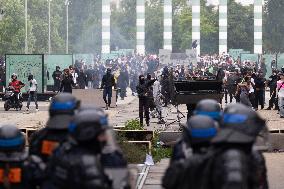 Protesters clash with police after the commemoration march for Nahel - Nanterre