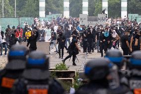 Protesters clash with police after the commemoration march for Nahel - Nanterre