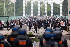 Protesters clash with police after the commemoration march for Nahel - Nanterre