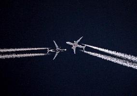Aircraft Ejecting Contrails