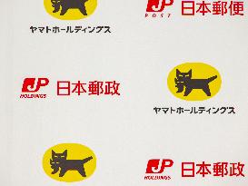 Logos of Japan Post and Yamato Holdings