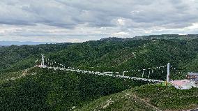 The Longest High-altitude Glass Suspension Bridge in Asia