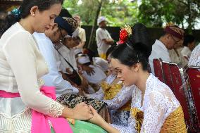 Balinese Tooth-filing Ceremony In Indonesia