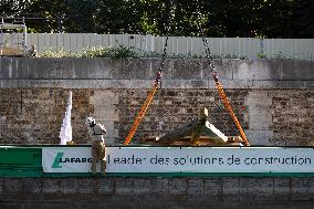 First truss delivered to Notre Dame by a barge cruises along the Seine - Paris