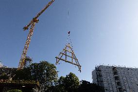 First truss delivered to Notre Dame by a barge cruises along the Seine - Paris