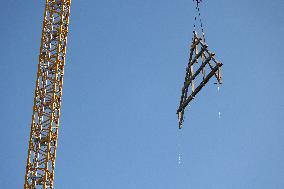 First truss delivered to Notre Dame by a barge cruises along the Seine - Paris