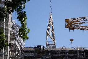 First truss delivered to Notre Dame by a barge cruises along the Seine - Paris