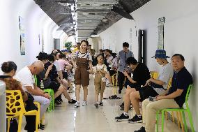 Citizens Cool Off At The Arctic Rock Civil Air Defense Project in Nanjing