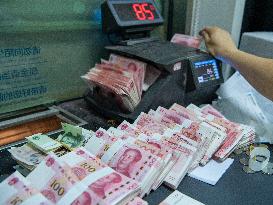 Chinese Yuan Loans Increase