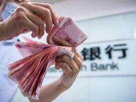 Chinese Yuan Loans Increase