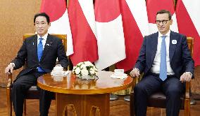Japan, Polish PMs hold talks