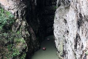 Tourists Cross The Hidden River By Boat To Escape The Heat in Chongqing