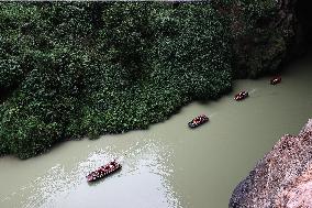 Tourists Cross The Hidden River By Boat To Escape The Heat in Chongqing