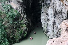 Tourists Cross The Hidden River By Boat To Escape The Heat in Chongqing