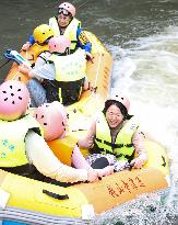 Tourists Experience River Rafting in Huai'an