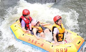 Tourists Experience River Rafting in Huai'an