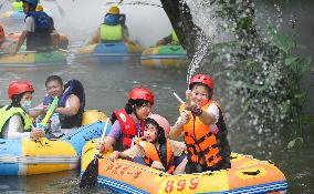 Tourists Experience River Rafting in Huai'an