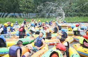 Tourists Experience River Rafting in Huai'an