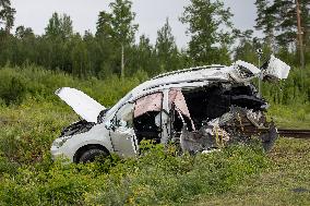 Crash between car and train