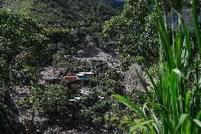 Landslide Leaves 14 Dead and a Dozen Missing in Central Colombia