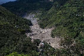 Landslide Leaves 14 Dead and a Dozen Missing in Central Colombia