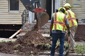 Flash Flooding Destroys Homes, Submerges Cars And Prompts Water Rescues In New Brunswick, New Jersey