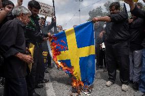 Iran, Reaction To Koran Burning In Stockholm