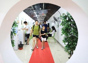 People Take Cool in The Arctic Rock Civil Air Defense Project in Nanjing, China