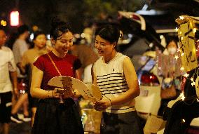 Citizens shop At A Car Trunk Market in Linyi, China