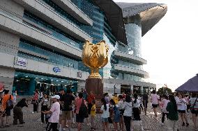 Tourists Visit Golden Bauhinia Square in Hong Kong, China