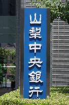 Signboard and logo of Yamanashi Chuo Bank