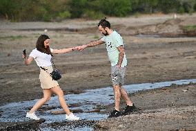 Relaxing at shallow bank of Dnipro River