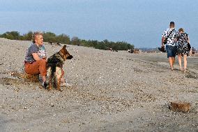 Relaxing at shallow bank of Dnipro River