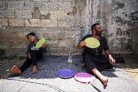 Palestinians In Gaza Struggle As Heatwave Adds To Electricity Shortage