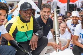 Usain Bolt and Tony Estanguet present Paris 2024 Olympic Torch - Paris