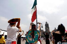 Dancers Celebrate The 698th Anniversary Of The Founding Of Mexico - Tenochtitlan