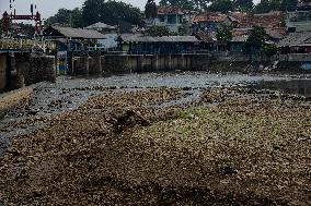 Water Level Decreased Due Hot Weather In Ciliwung River Indonesia