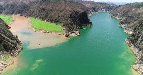 The Green Tao River And The Yellow River Meet in the Liujiaxia Reservoir Area