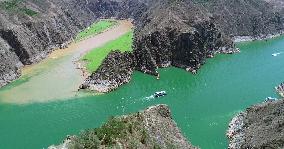 The Green Tao River And The Yellow River Meet in the Liujiaxia Reservoir Area