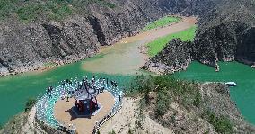 The Green Tao River And The Yellow River Meet in the Liujiaxia Reservoir Area