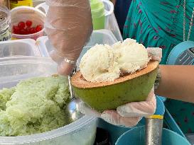 Coconut Ice Cream Served In A Coconut