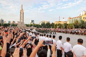 People Watched The National Flag Raising Ceremony in Nanchang, China