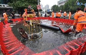 Xinhua Headlines: China goes all out to tackle typhoon-induced torrential rain, floods