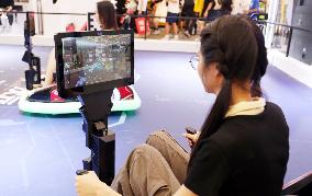 Visitors Experience VR Game at ChinaJoy2023 in Shanghai, China