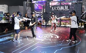 Visitors Experience VR Game at ChinaJoy2023 in Shanghai, China