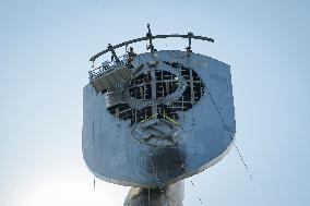 Dismantling The Coat Of Arms Of The USSR From The Statue "Motherland" In Kyiv