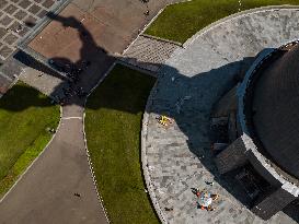Workers Dismount A Soviet Coat Of Arms From The Shield Of The Motherland Monument In Kyiv
