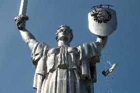 Workers Dismount A Soviet Coat Of Arms From The Shield Of The Motherland Monument In Kyiv